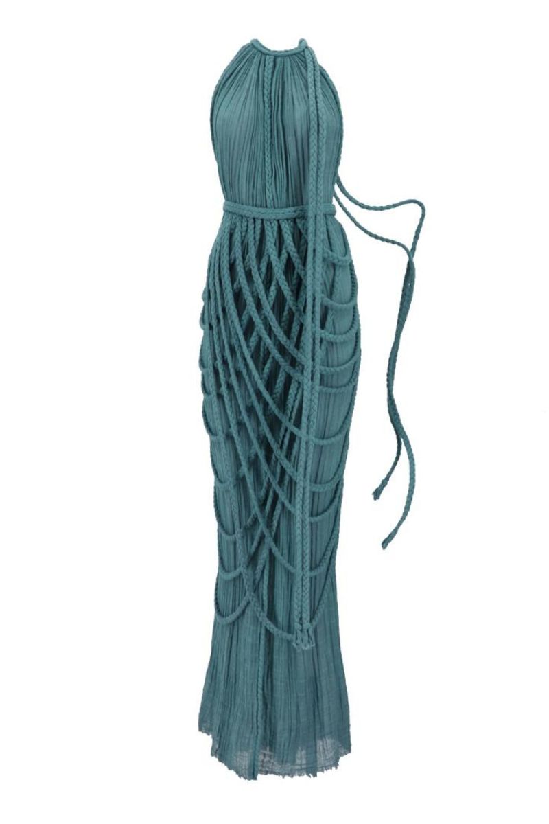 Kasia Kulenty Vera emerald maxi gown featuring flowing fabric and elegant design, perfect for formal occasions.