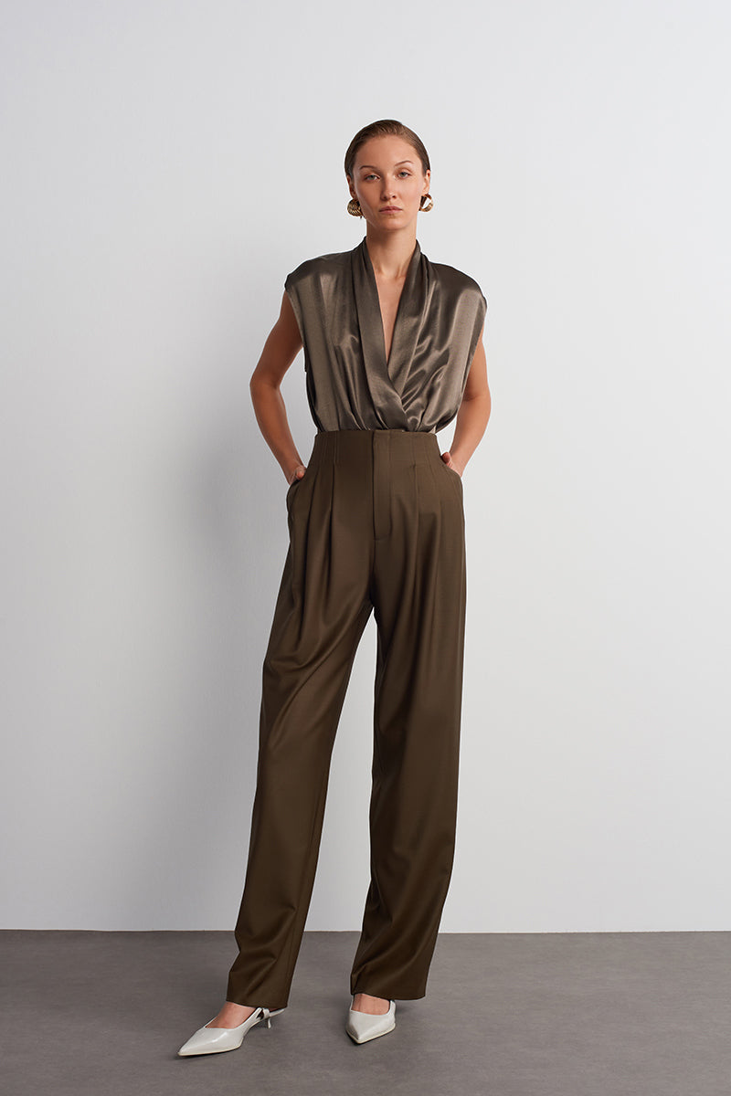 Dark brown Earth Pants by Acaria Studio, casual pants with a relaxed fit and earthy tone, displayed on a plain background.