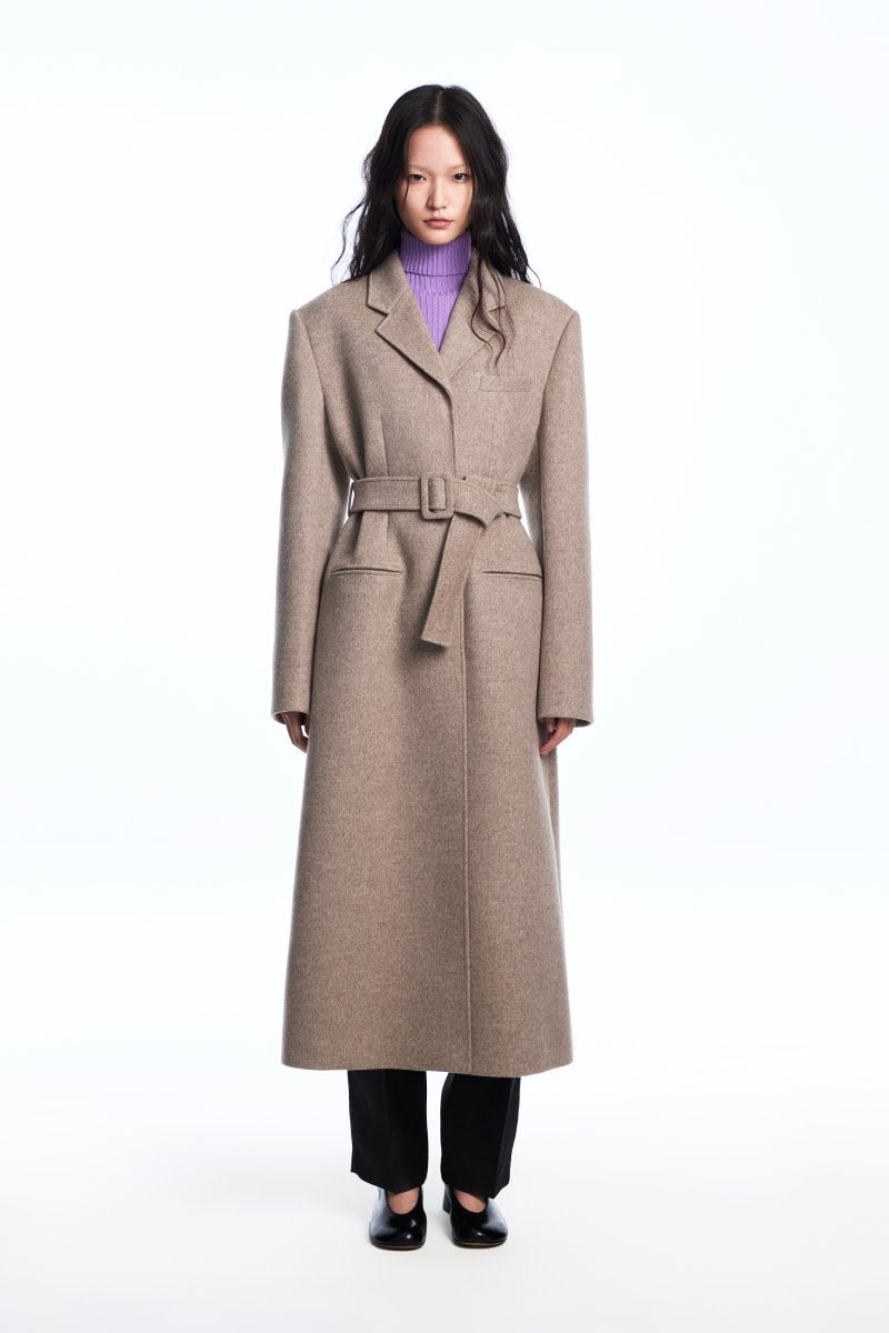 Chictopia belted long line coat in neutral fabric, front view showing tailored fit and stylish belt detail.