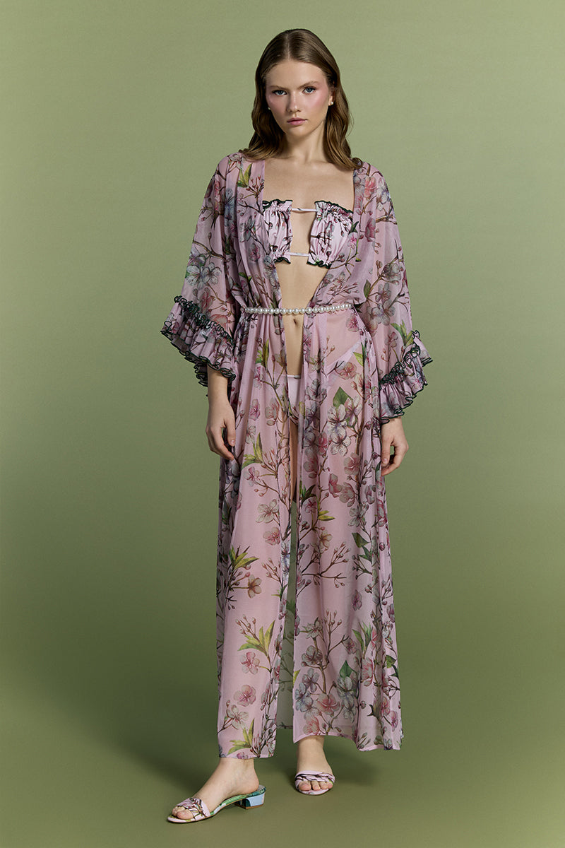 Nur Karaata mango mojito beach dress cover-up displayed on a model, featuring lightweight fabric and vibrant tropical print.