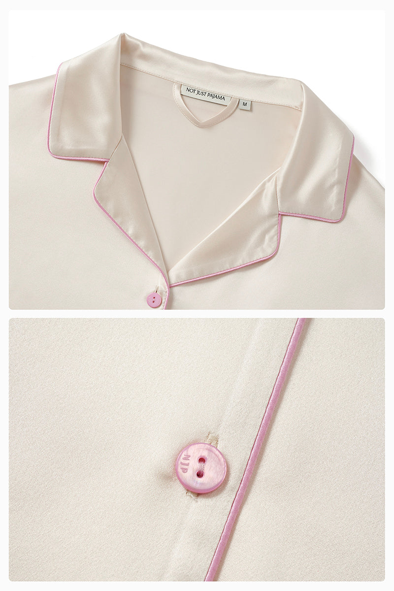 Soft blush pink silk pajama set by Not Just Pajama featuring long sleeves and relaxed fit for comfortable sleepwear.