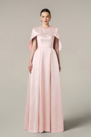 Pink silk taffeta gown by I.H.F, featuring elegant flowing fabric and a sophisticated design for formal occasions.