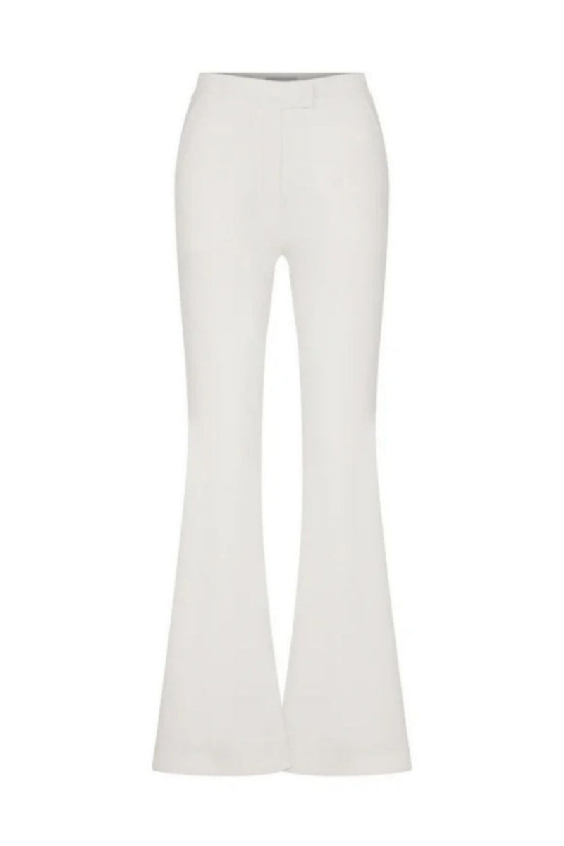 Nazlı Ceren Marylebone crepe flared trousers in vanilla ice, showing the stylish high-waisted pants with a flared leg silhouette.