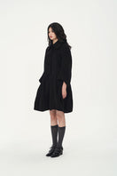 Chictopia women's wool coat featuring a classic design with a tailored fit and button closure, ideal for winter warmth.