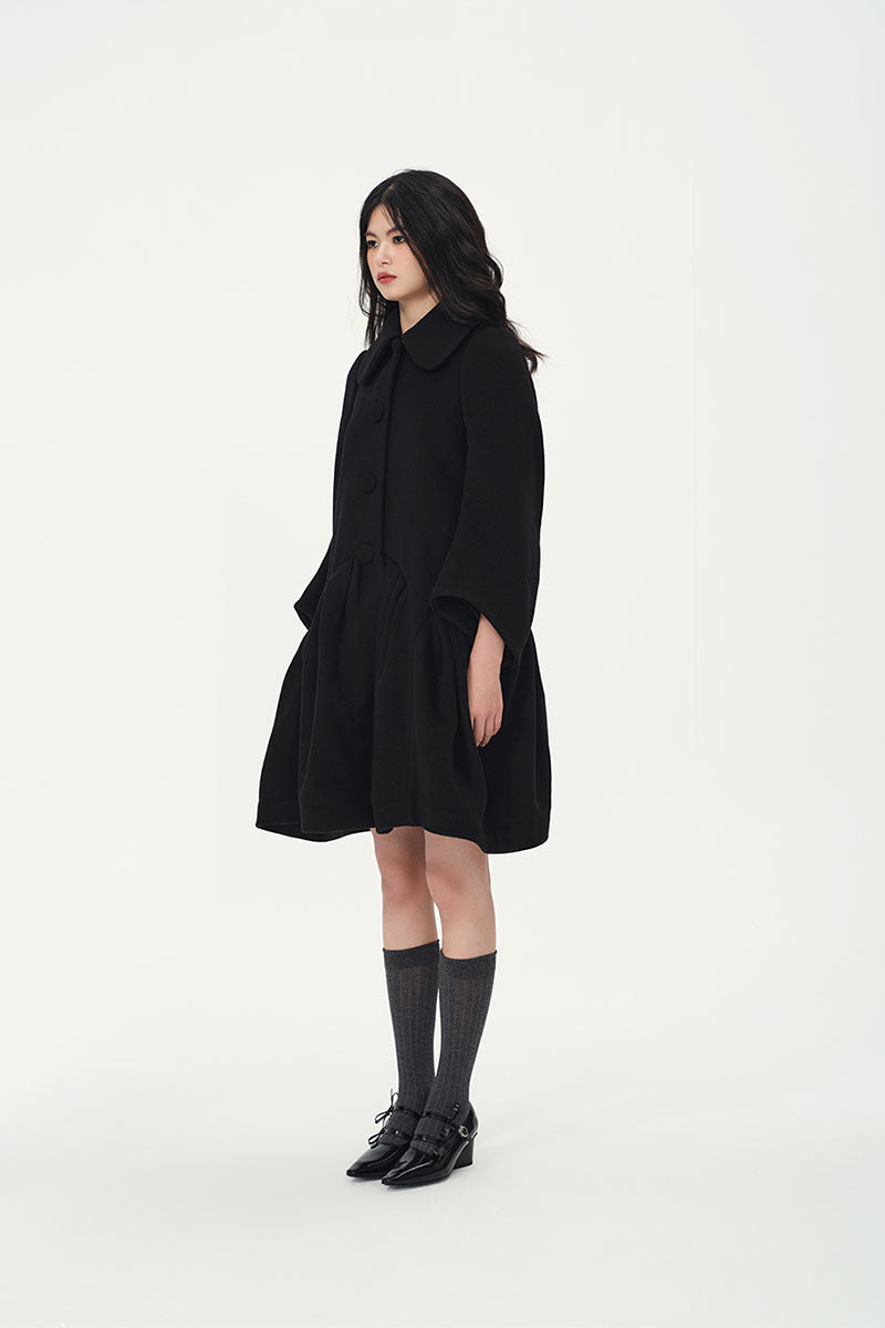 Chictopia women's wool coat featuring a classic design with a tailored fit and button closure, ideal for winter warmth.