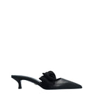 Black nappa and mesh side tie mule heels by House of Atana featuring sleek design and stylish strap details.