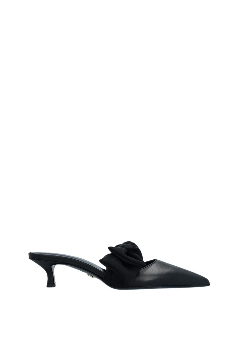 Black nappa and mesh side tie mule heels by House of Atana featuring sleek design and stylish strap details.