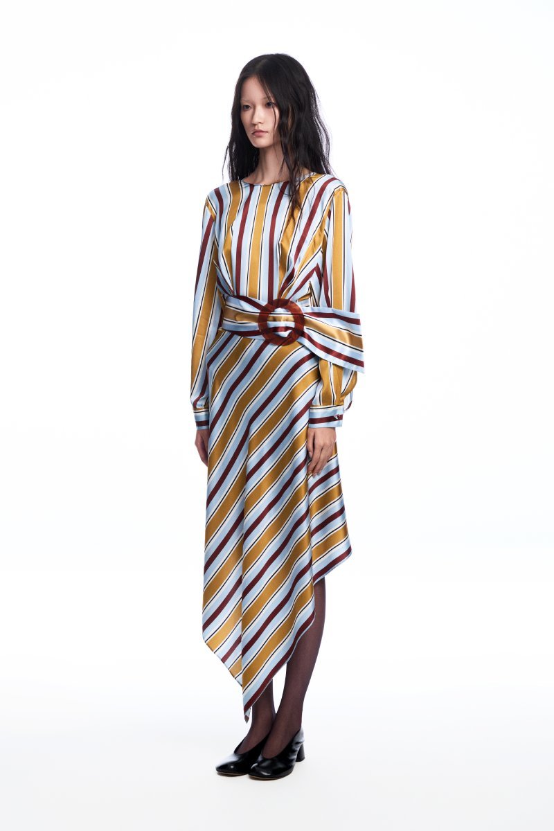 Chictopia silk belted striped midi dress hanging on a mannequin, showcasing its elegant design and vibrant pattern.