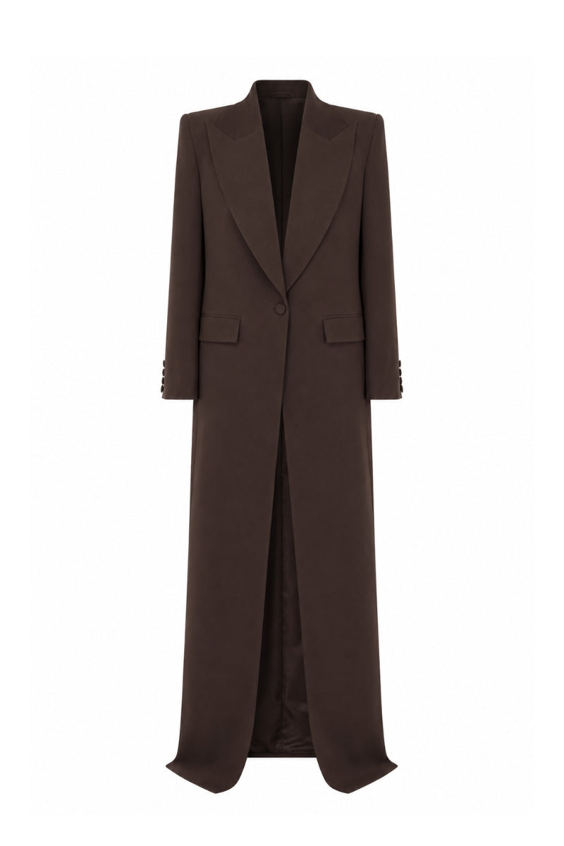 Lili Blanc oversized coat in neutral fabric, shown on a model with wide lapels and relaxed fit, perfect for stylish cold-weather wear.