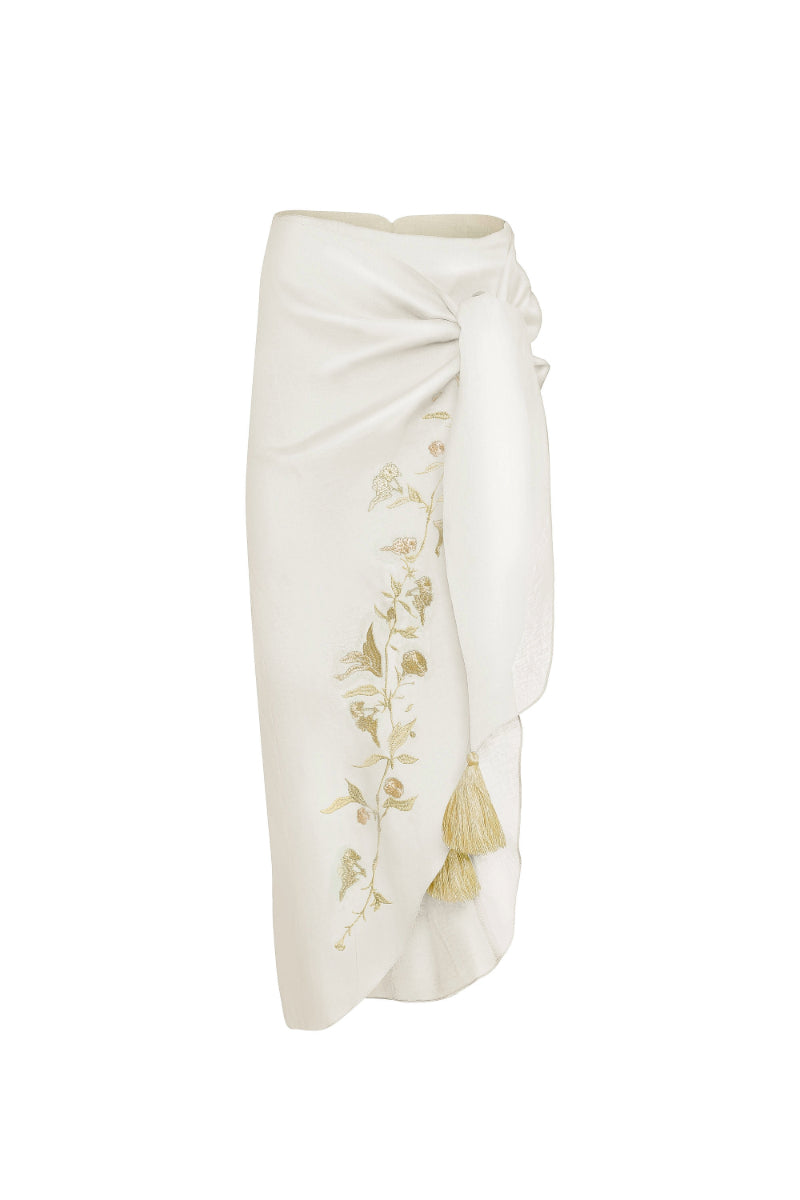 White gold Lilies pareo skirt by Estefania, midi length with flowing fabric and floral pattern, perfect for summer wear.