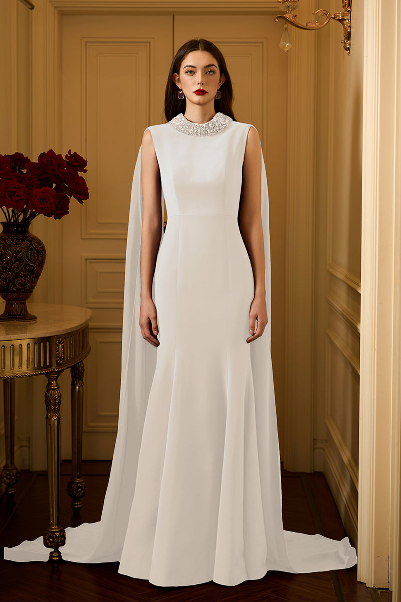 I.H.F Lula Crepe Cape Gown shown in elegant black, featuring flowing fabric and sophisticated design perfect for formal occasions.