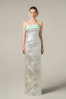 Green metallic jacquard and silk taffeta gown by I.H.F, featuring intricate fabric details and elegant design.