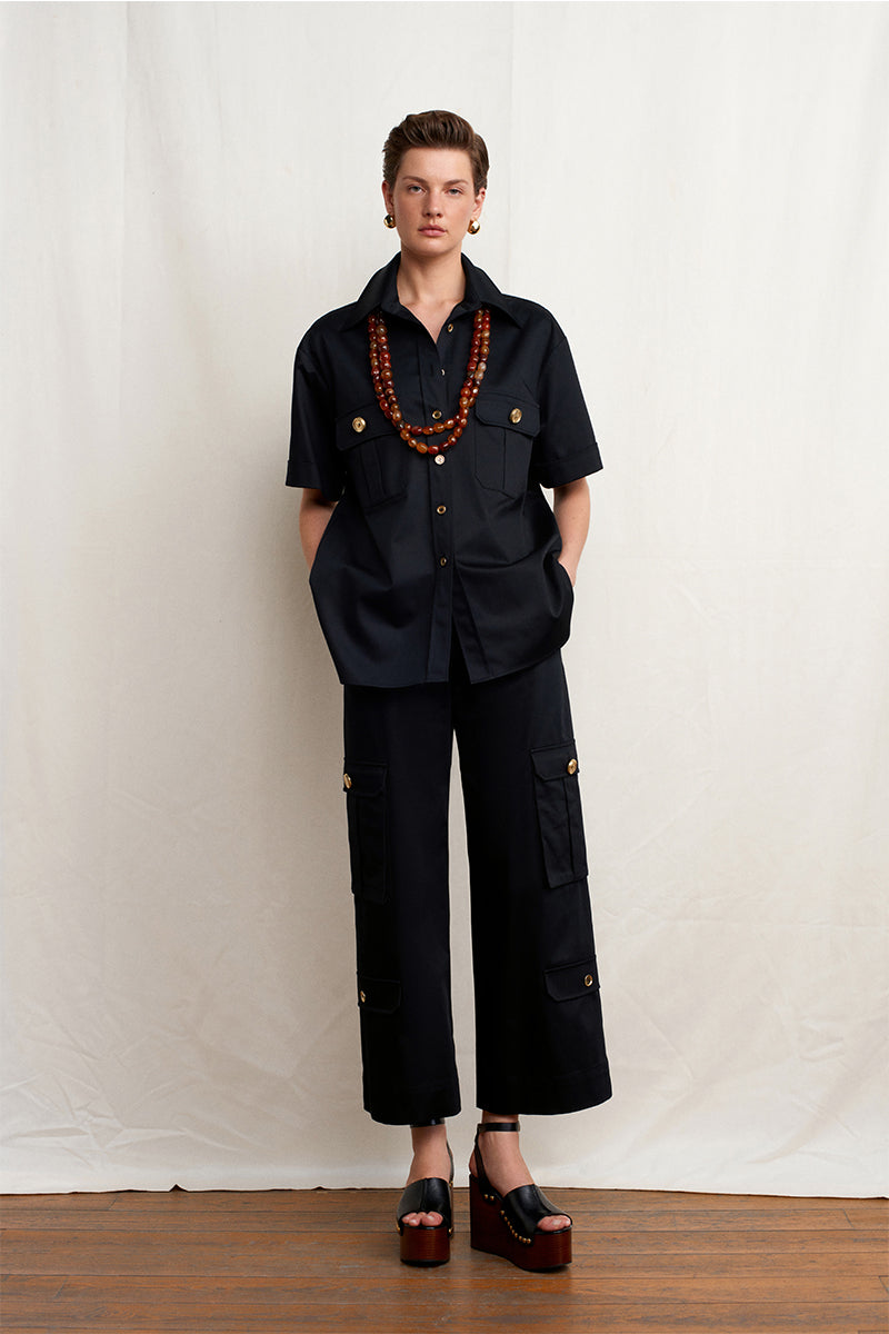 Black Warrior Wide Pants by Acaria Studio, featuring a relaxed fit and wide-leg design, shown on a model.