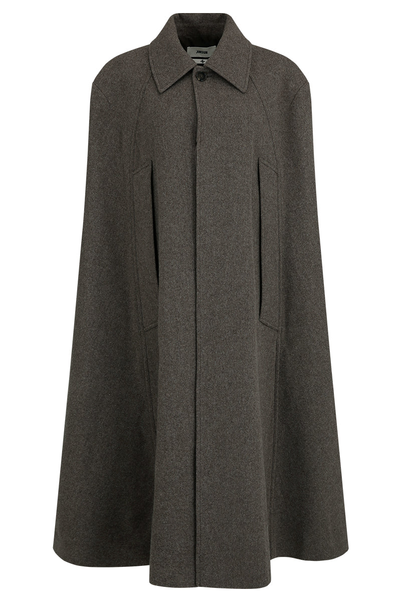 Brown long wool cape coat by JINSUN, featuring a flowing silhouette and classic design, displayed on a hanger.