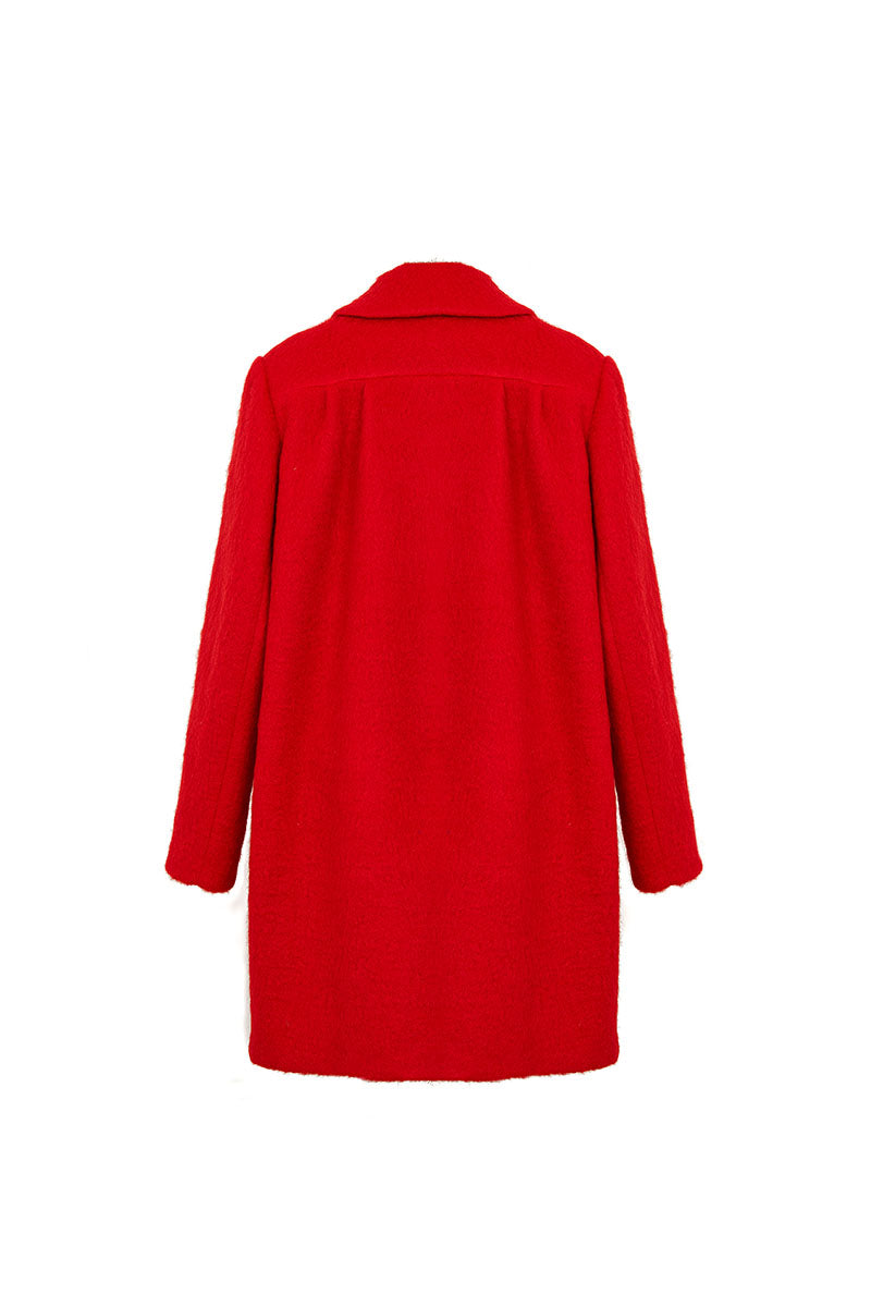 Chictopia ruby wool coat displayed on a model, featuring a classic tailored fit, warm red color, and stylish lapel collar.