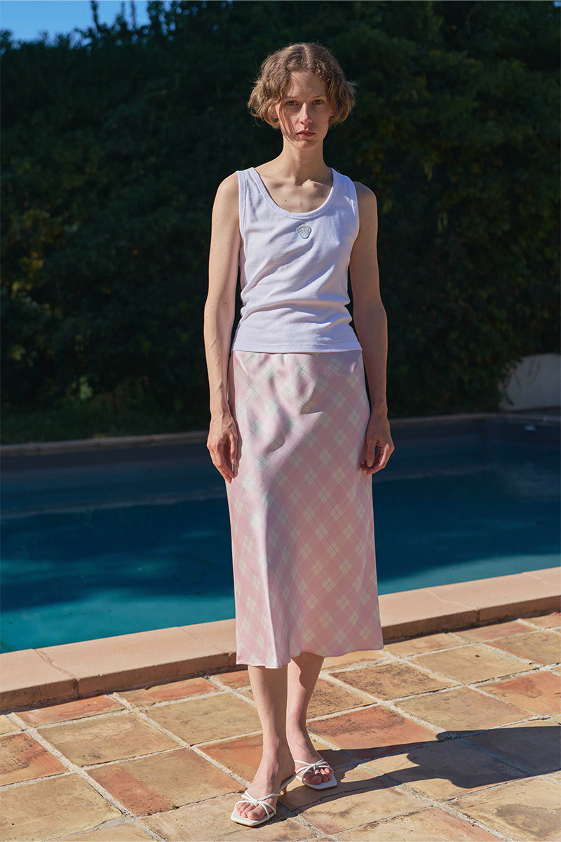 KIKI CAT 22 MOMME Mulberry Pink Silk Bias Midi Skirt by Not Just Pajama, showcasing smooth silk fabric and elegant midi length.