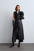 Black Mercury leather vest by Acaria Studio, featuring a sleek design and fitted silhouette, displayed on a mannequin.