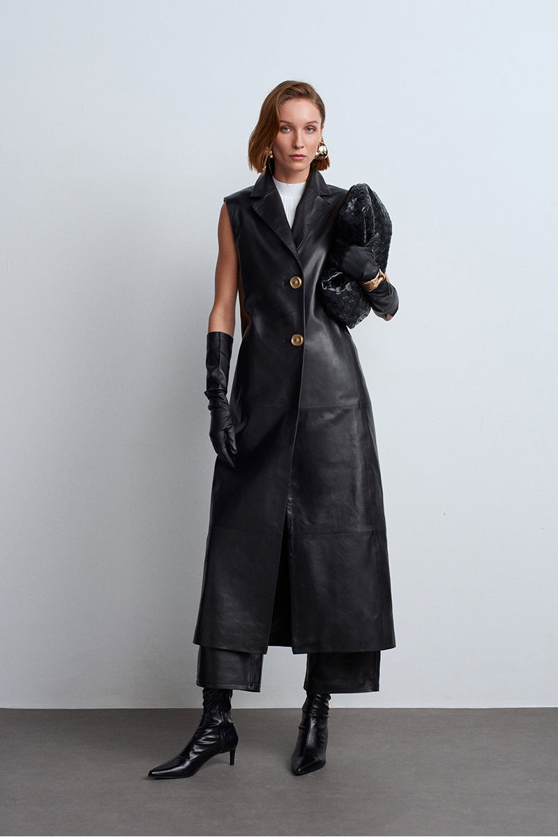 Black Mercury leather vest by Acaria Studio, featuring a sleek design and fitted silhouette, displayed on a mannequin.