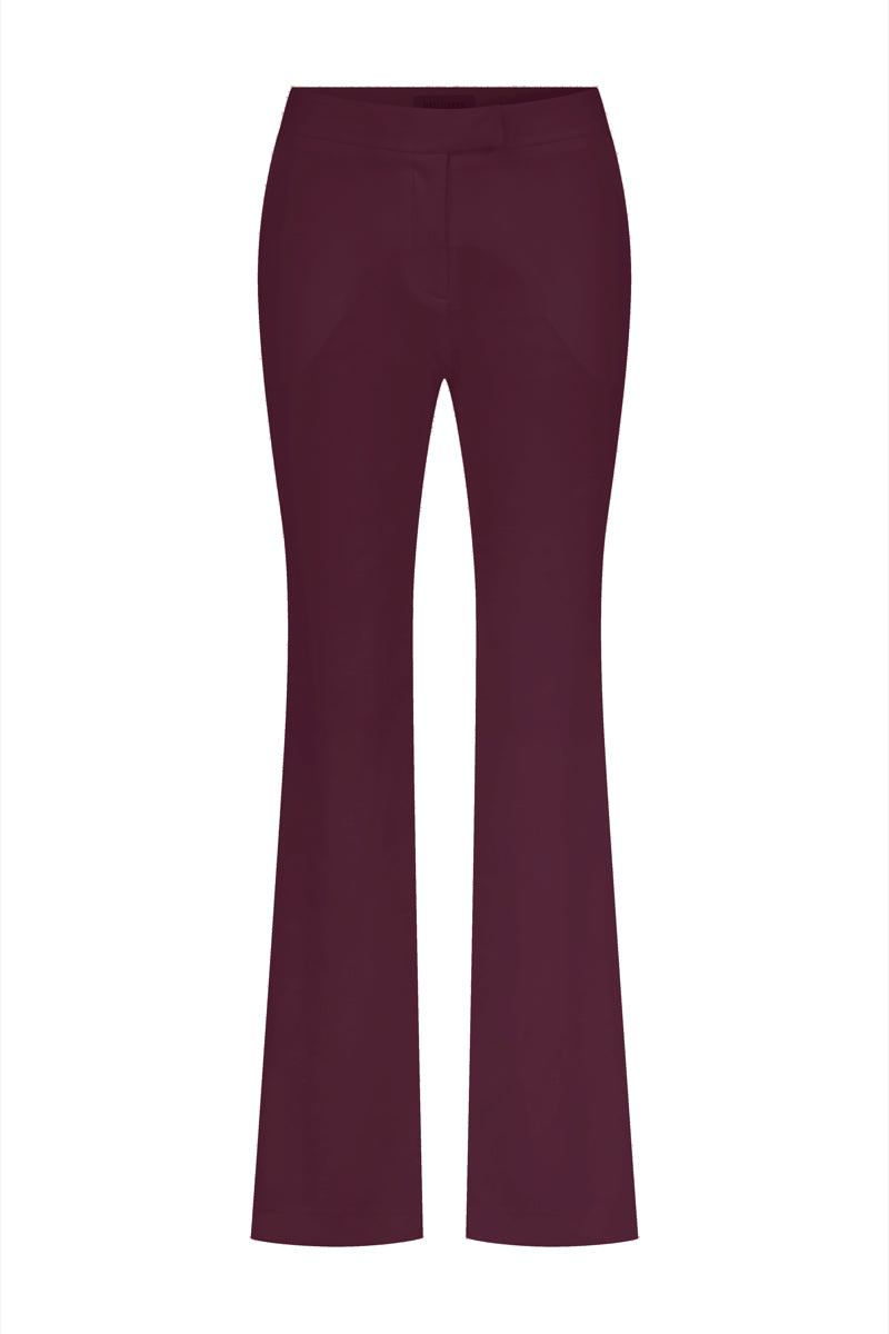 Nazlı Ceren arced trousers in Bordeaux, stylish pants with a relaxed fit and modern design, shown in the image.