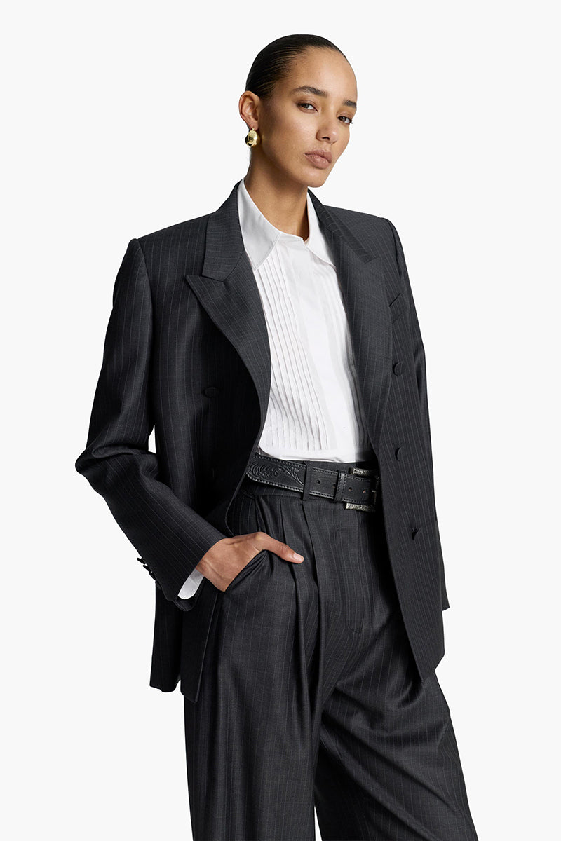 Gray striped Jasmin blazer by Acaria Studio, tailored fit, featuring lapels and button closure, displayed on a hanger.