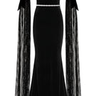 Nur Karaata Daisy Gown displayed on a mannequin, featuring a flowing design with floral accents and elegant fabric details.
