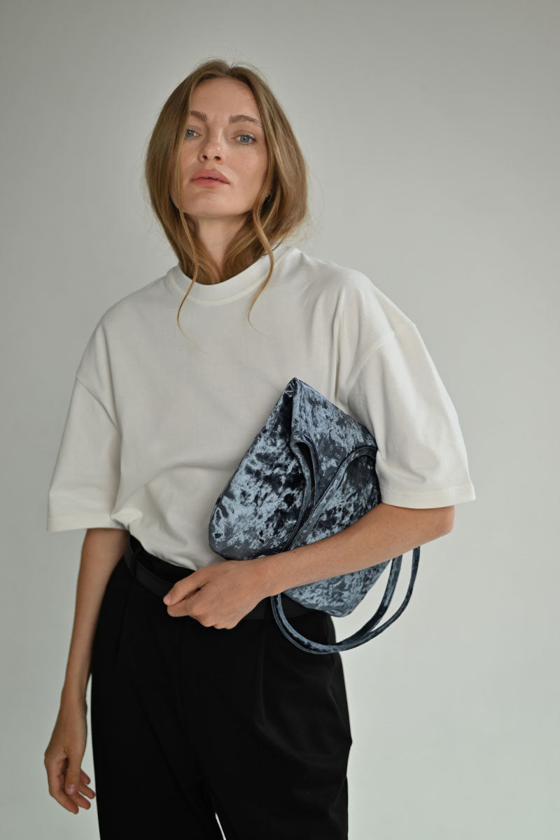Gray GIGI shoulder bag by VIKELE STUDIO featuring a sleek design and shoulder strap, made from durable material.
