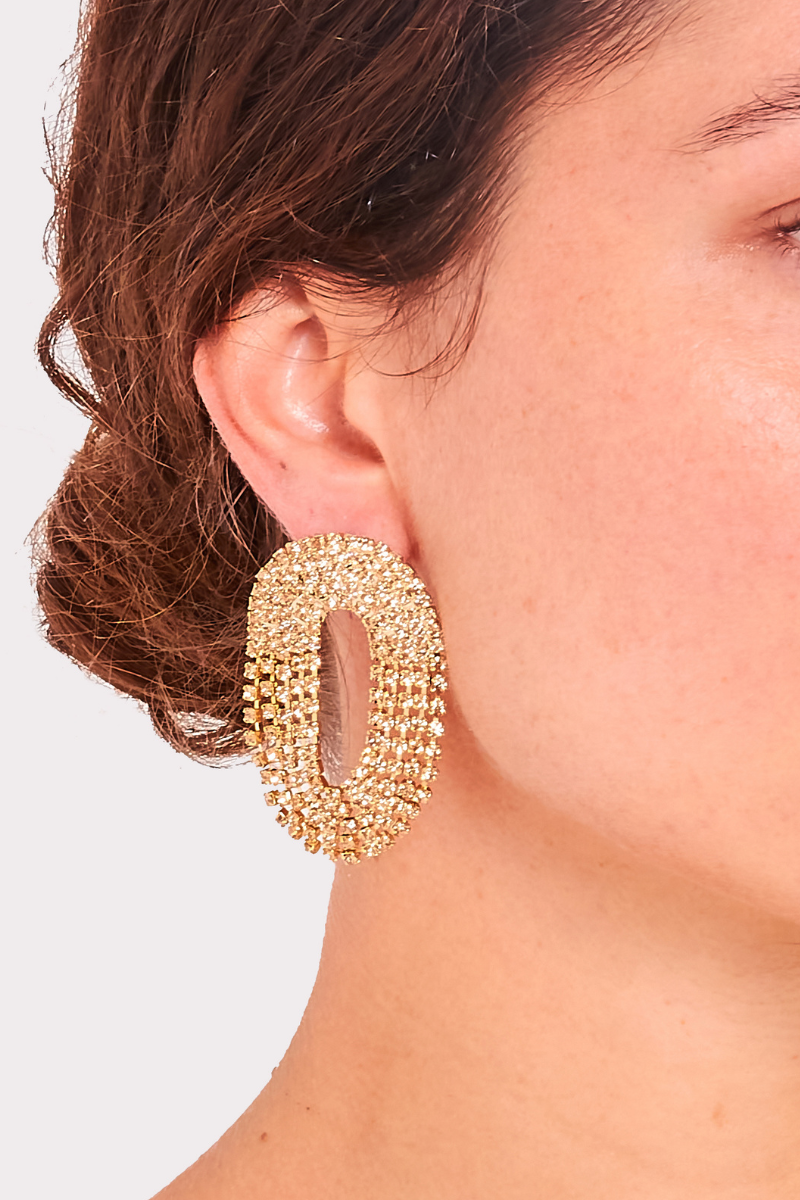 Silver Liberty One earrings by Silvia Gnecchi featuring minimalist geometric designs on a plain background