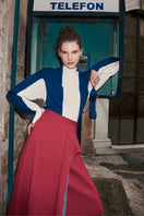 Labeca Keyra red and blue striped cotton midi skirt with a flowing design and classic striped pattern.