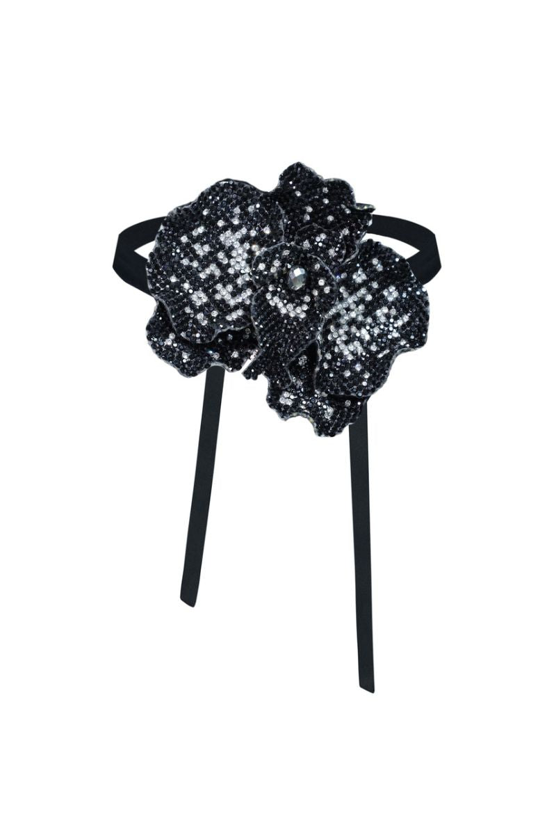 Nué Black Orchid Crystal Choker necklace featuring sparkling crystals and a sleek black design for elegant style.