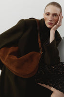 Brown suede Denise shoulder bag by Vikele Studio with a sleek, minimalist design and subtle stitching details.