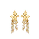 Peracas MINI Adile Ivory earrings showcasing small, elegant dangle earrings with a smooth ivory finish.