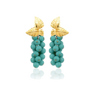Turquoise DAFNE earrings by PERACAS featuring vibrant, handcrafted jewelry with intricate design and silver accents.