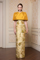 Yellow floral sleeveless gown with a round neck from I.H.F, showcasing a flowy fabric and vibrant floral pattern.