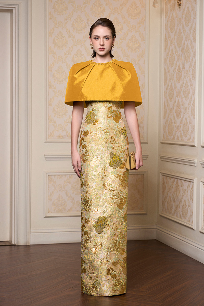 Yellow floral sleeveless gown with a round neck from I.H.F, showcasing a flowy fabric and vibrant floral pattern.