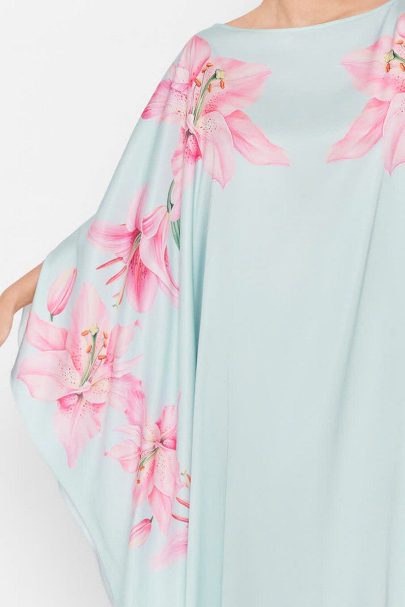 Valenciani Oasis Maxi Kaftan in multicolor with vibrant patterns, flowing fabric, and relaxed fit, perfect for summer or beach wear.