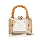 Waiwai Rio Alix Bambu Bag in Crystal, a clear top handle bag with bamboo accents, showcasing its transparent design and elegant craftsmanship.