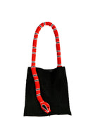 Black Serpent Big shoulder bag by SAC DE SOUL with red and white snake print design, stylish and spacious for daily use.
