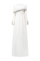 Elegant Tracy Studio gown with a diagonal crystal-embellished shoulder, A-line silhouette, sleeveless design, and flowing fabric.