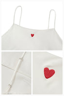 White Little Heart slip dress nightgown from Not Just Pajama, featuring delicate heart details and lightweight fabric.