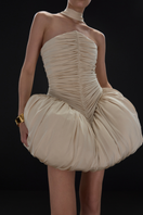 Beige Clara mini dress by BALYKINA featuring a stylish, fitted silhouette and elegant design perfect for casual or dressy occasions.