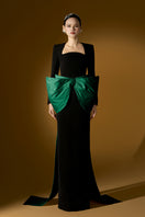 Elegant green Loreli crepe and taffeta gown by I.H.F, showcasing flowing fabric and intricate design details.