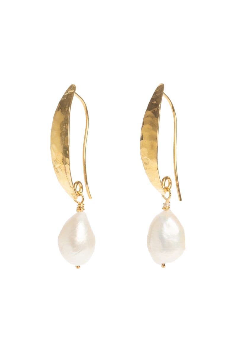Hammered gold Baroque pearl earrings by Freya Rose featuring large irregular pearl drops and textured gold hooks.