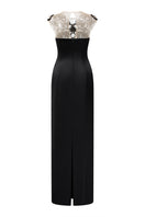 Black LYCRA taffeta gown by Lune De Soie featuring a sleek, elegant design with a fitted silhouette and subtle sheen.