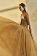 L'SCARLETT off-shoulder chiffon and mesh gown with flowing fabric and elegant design, perfect for formal occasions.