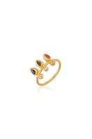 Peracas Ginevra Trio Ring featuring three stacked gold bands with intricate detailing and a polished finish.