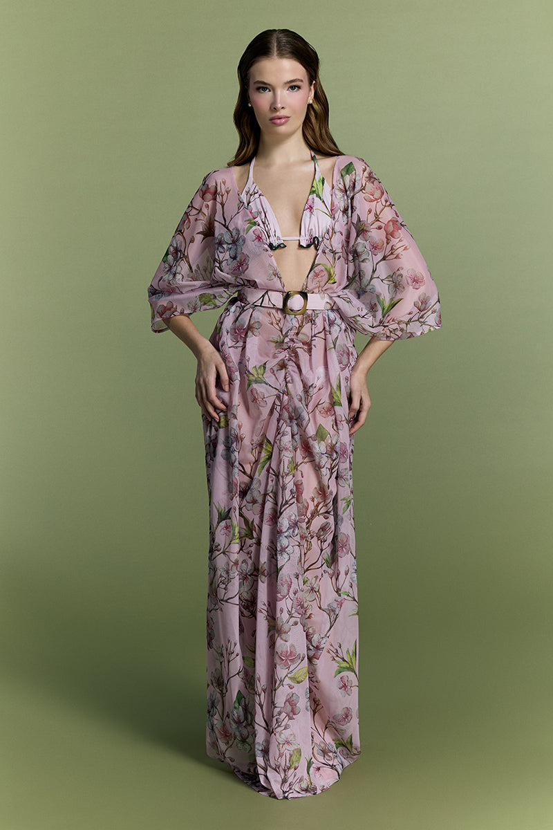 Nur Karaata Island Mirage cover-up featuring lightweight, flowy fabric with tropical print for beach or poolside wear.