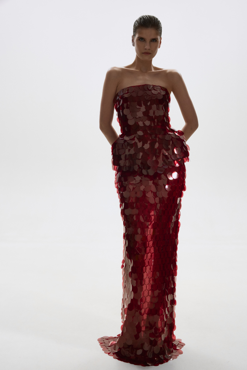 Sequin burgundy corset top by Balykina with fitted design and decorative sequin embellishments on the front.