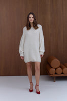 Undress Alexa Cream Mini Sweater Dress, stylish short dress with cozy cream knit fabric, perfect for casual or semi-formal wear.