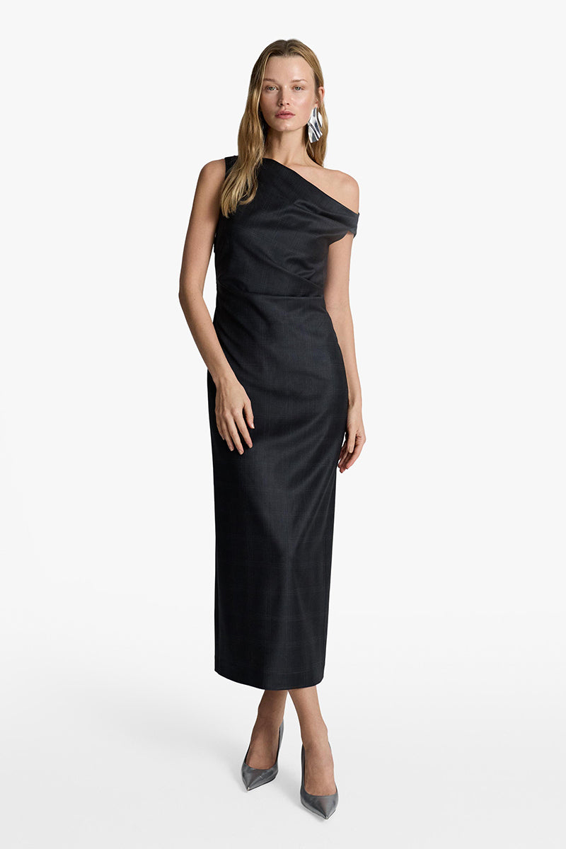 Acaria Studio Anna Dress, a stylish midi dress with a flowing silhouette and elegant design, shown on a model.
