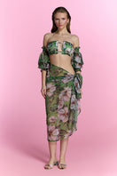 Nur Karaata Sheer Escape Pareo cover-up with lightweight, translucent fabric, ideal for beachwear or poolside fashion.